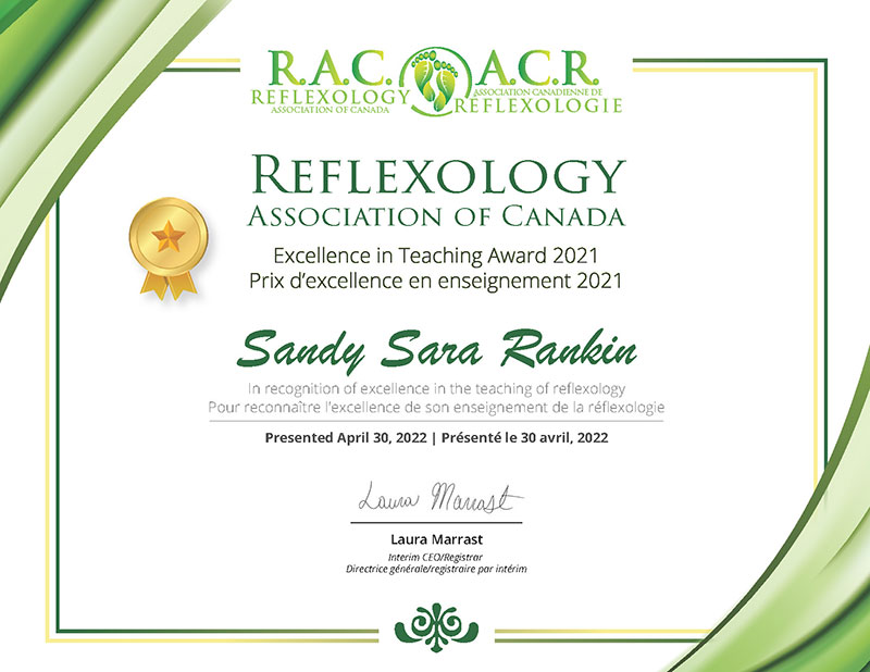 Reflexology teacher Sandy Rankin receives Excellence in Teaching Award from the Reflexology Association of Canada.